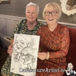 Caricature Artist Limerick Two Wedding Guests with Caricature in Devon Inn Limerick by Allan Cavanagh (13)
