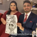 Caricature Artist Limerick Two Wedding Guests with Caricature in Devon Inn Limerick by Allan Cavanagh (2)