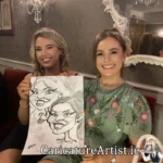 Caricature Artist Limerick Two Wedding Guests with Caricature in Devon Inn Limerick by Allan Cavanagh (6)