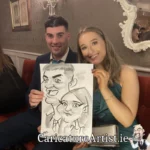 Caricature Artist Limerick Two Wedding Guests with Caricature in Devon Inn Limerick by Allan Cavanagh (7)