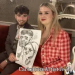 Caricature Artist Limerick Two Wedding Guests with Caricature in Devon Inn Limerick by Allan Cavanagh (8)