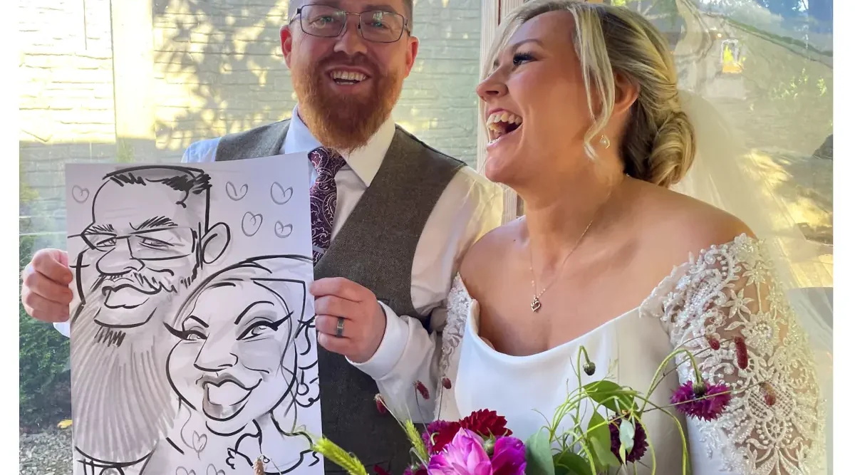 mountain view kilkenny wedding entertainment photo of bride and groom laughing with caricature
