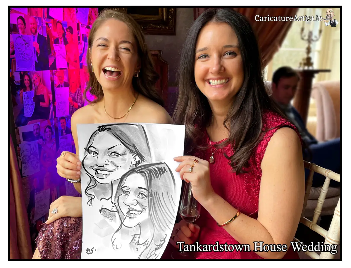 Tankardstown House Wedding Entertainment Live Caricatures by Allan Cavanagh two women laughing holding a caricature drawing by Caricaturist Allan Cavanagh