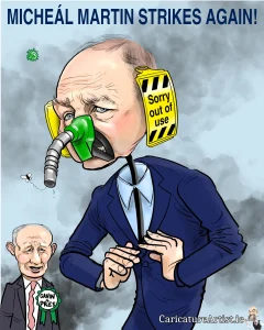 Fuel Protests Ireland Micheál Martin Cartoon Cartoon of Micheál Martin with a petrol pump for a nose and out of use tags for ears to our left Jim Gavin looks on, the title says Micheál Martin Strikes Again!