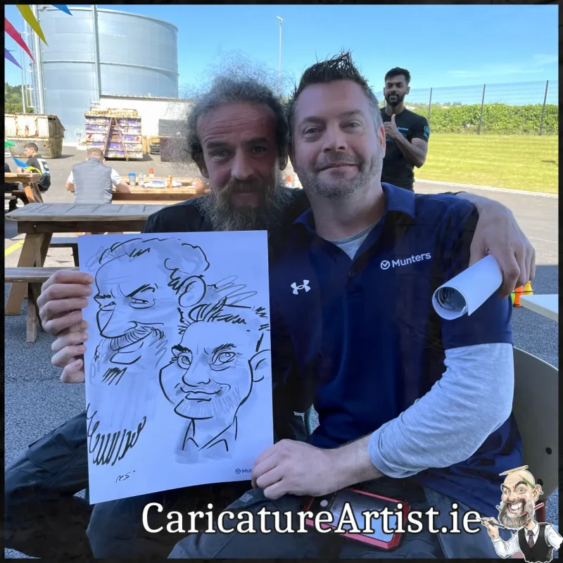 Staff Summer Party Entertainment Ireland Caricatures by Allan Cavanagh Cork Photo of 2 people holding caricature drawing of themselves(23)