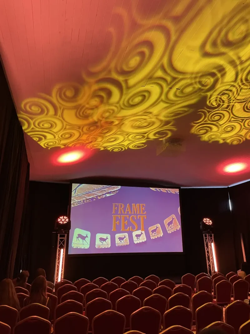 Frame Fest Stop Motion Festival 2 2026 08 31 21 10 Frame Fest Stop Motion Festival 2026 hall with seating and projection screen with atmospheric lighting on the roof